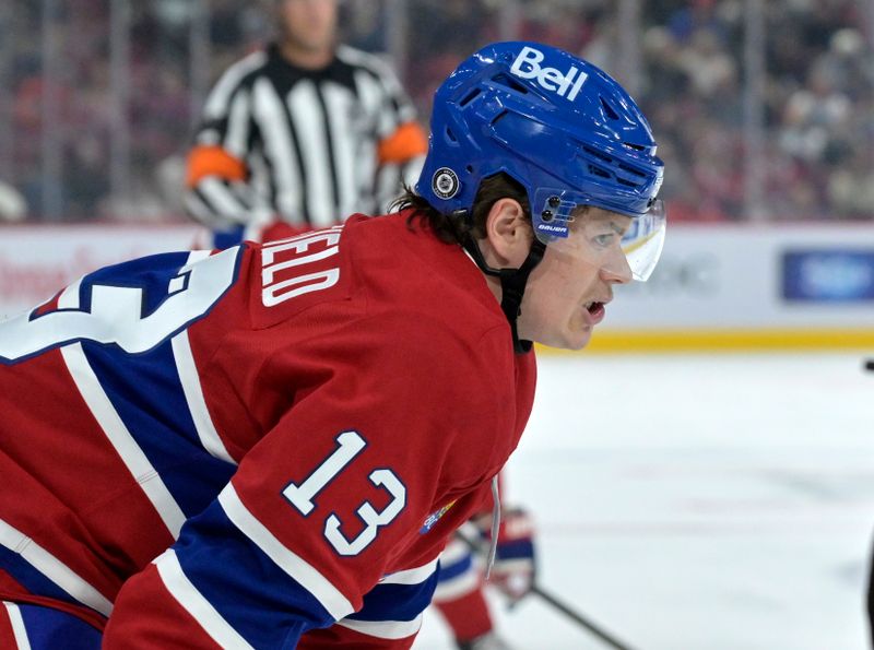 Sep 24, 2024; Montreal, Quebec, CAN;  Montreal Canadiens forward Cole Caufield (13) prepares for a face off against the New Jersey Devils during the first period at the Bell Centre. Mandatory Credit: Eric Bolte-Imagn Images