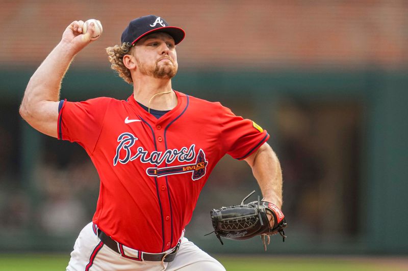 Aug 2, 2024; Cumberland, Georgia, USA; Atlanta Braves starting pitcher Spencer Schwellenbach (56) pitches against the Miami Marlins during the first inning at Truist Park. Mandatory Credit: Dale Zanine-USA TODAY Sports