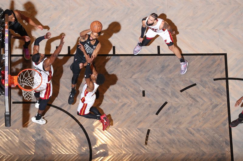 BROOKLYN, NY - JANUARY 15: Mikal Bridges #1 of the Brooklyn Nets shoots the ball during the game against the Miami Heat on January 15, 2024 at Barclays Center in Brooklyn, New York. NOTE TO USER: User expressly acknowledges and agrees that, by downloading and or using this Photograph, user is consenting to the terms and conditions of the Getty Images License Agreement. Mandatory Copyright Notice: Copyright 2024 NBAE (Photo by Nathaniel S. Butler/NBAE via Getty Images)