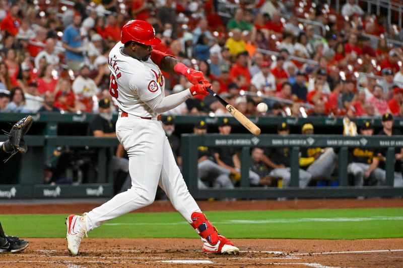 Sep 17, 2024; St. Louis, Missouri, USA;  St. Louis Cardinals right fielder Jordan Walker (18) hits a solo home run against the Pittsburgh Pirates during the fourth inning at Busch Stadium. Mandatory Credit: Jeff Curry-Imagn Images