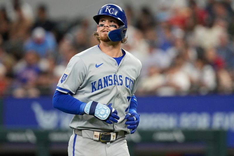 Jun 23, 2024; Arlington, Texas, USA; Kansas City Royals shortstop Bobby Witt Jr. (7) returns to the dugout after grounding out against the Texas Rangers during the seventh inning at Globe Life Field. Mandatory Credit: Jim Cowsert-USA TODAY Sports