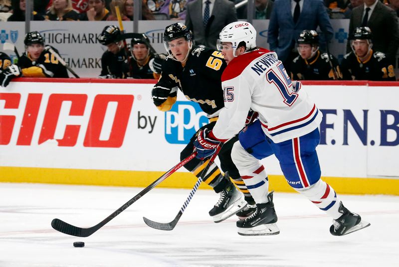 Feb 22, 2024; Pittsburgh, Pennsylvania, USA; Montreal Canadiens center Alex Newhook (15) moves the puck against Pittsburgh Penguins center Noel Acciari (55) during the first period at PPG Paints Arena. Mandatory Credit: Charles LeClaire-USA TODAY Sports