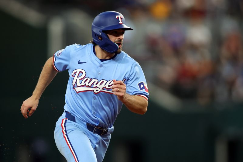 Jul 7, 2024; Arlington, Texas, USA; Texas Rangers third base Josh Smith (8) runs to third base in the eighth inning against the Tampa Bay Rays at Globe Life Field. Mandatory Credit: Tim Heitman-USA TODAY Sports