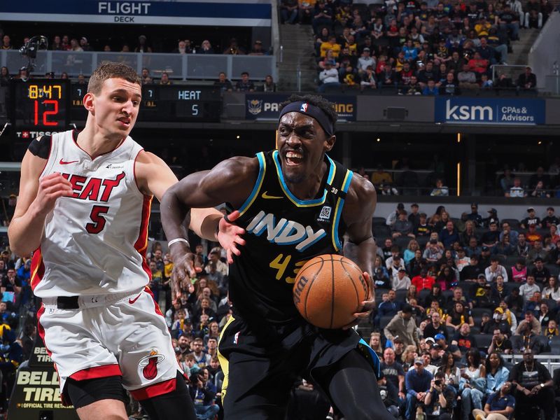 INDIANAPOLIS, IN - APRIL 7: Pascal Siakam #43 of the Indiana Pacers drives to the basket during the game against the Miami Heat on April 7, 2024 at Gainbridge Fieldhouse in Indianapolis, Indiana. NOTE TO USER: User expressly acknowledges and agrees that, by downloading and or using this Photograph, user is consenting to the terms and conditions of the Getty Images License Agreement. Mandatory Copyright Notice: Copyright 2024 NBAE (Photo by Ron Hoskins/NBAE via Getty Images)