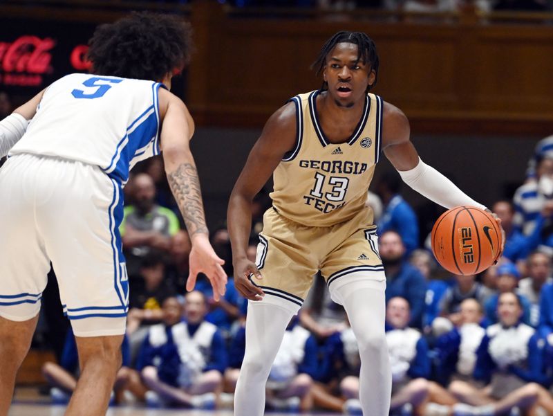 Jan 13, 2024; Durham, North Carolina, USA; Georgia Tech Yellow Jackets guard Miles Kelly (13) controls the ball against Duke Blue Devils guard Tyrese Proctor (5) during the first half at Cameron Indoor Stadium. Mandatory Credit: Rob Kinnan-USA TODAY Sports