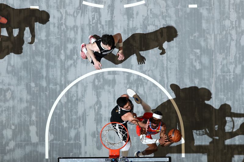 MEMPHIS, TN - MARCH 16:  Shai Gilgeous-Alexander #2 of the Oklahoma City Thunder drives to the basket during the game against the Memphis Grizzlies on March 16, 2024 at FedExForum in Memphis, Tennessee. NOTE TO USER: User expressly acknowledges and agrees that, by downloading and or using this photograph, User is consenting to the terms and conditions of the Getty Images License Agreement. Mandatory Copyright Notice: Copyright 2024 NBAE (Photo by Joe Murphy/NBAE via Getty Images)