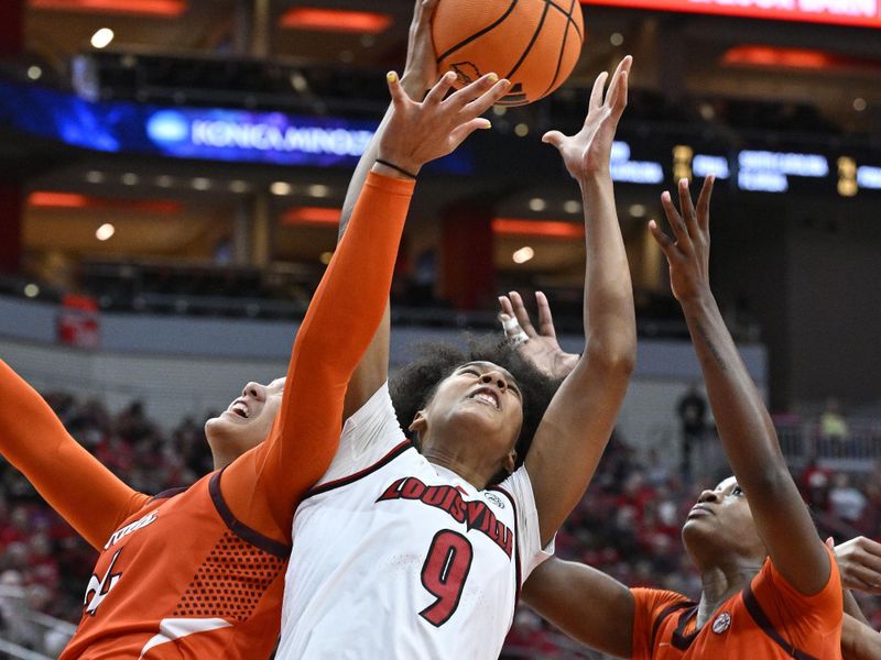 Jan 4, 2026; Louisville, Kentucky, USA;  Louisville Cardinals forward Anaya Hardy (9) battles Virginia Tech Hokies forward Amani Jenkins (24) and guard Samyha Suffren (12) for a rebound during the first half at KFC Yum! Center. Mandatory Credit: Jamie Rhodes-Imagn Images