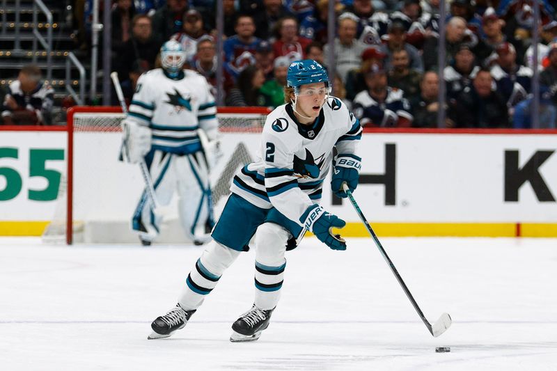 Mar 6, 2025; Denver, Colorado, USA; San Jose Sharks center Will Smith (2) controls the puck in the first period against the Colorado Avalanche at Ball Arena. Mandatory Credit: Isaiah J. Downing-Imagn Images