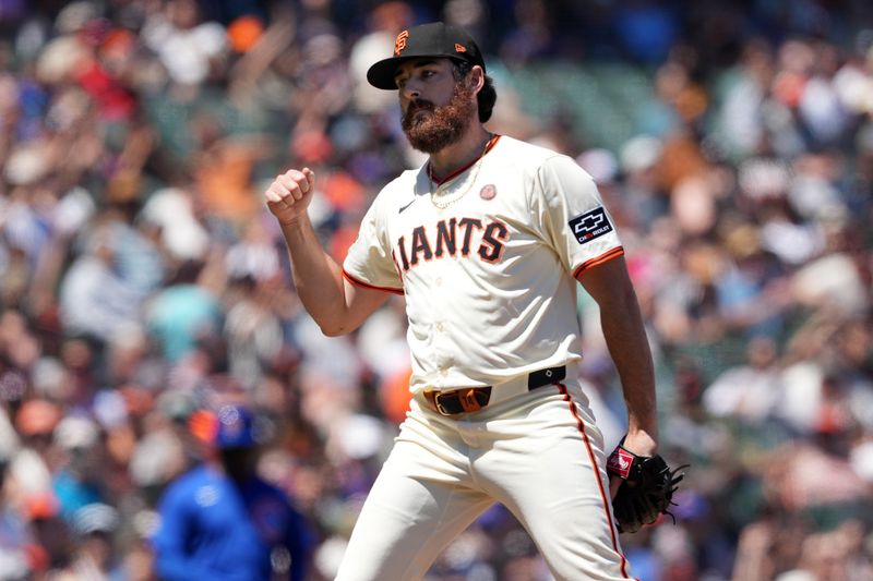 Jun 27, 2024; San Francisco, California, USA; San Francisco Giants relief pitcher Ryan Walker (74) reacts after the final out of the top of the eighth inning against the Chicago Cubs at Oracle Park. Mandatory Credit: Darren Yamashita-USA TODAY Sports