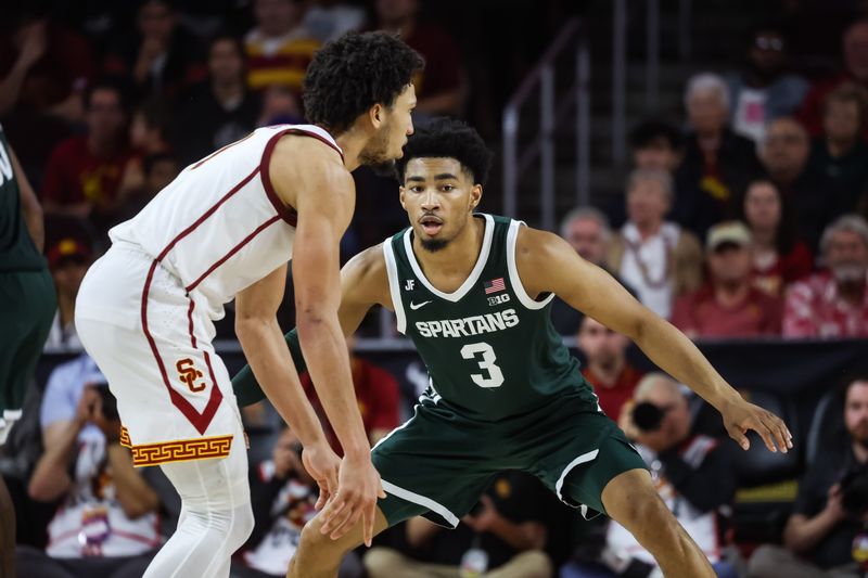 Feb 1, 2025; Los Angeles, California, USA;  Michigan State Spartans guard Jaden Akins (3) plays on defense against the USC Trojans at Galen Center. Mandatory Credit: William Navarro-Imagn Images