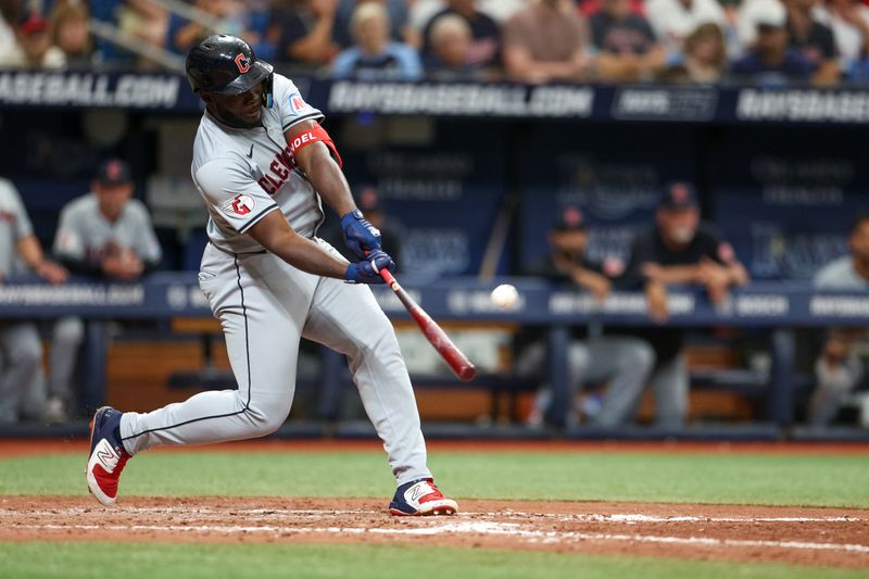 Jul 13, 2024; St. Petersburg, Florida, USA; Cleveland Guardians outfielder Jhonkensy Noel (43) hits a two run home run against the Tampa Bay Rays in the eighth inning  at Tropicana Field. Mandatory Credit: Nathan Ray Seebeck-USA TODAY Sports