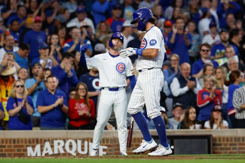 Sep 2, 2024; Chicago, Illinois, USA; Chicago Cubs shortstop Dansby Swanson (7) crosses home plate after hitting a solo home run against the Pittsburgh Pirates during the third inning at Wrigley Field. Mandatory Credit: Kamil Krzaczynski-USA TODAY Sports