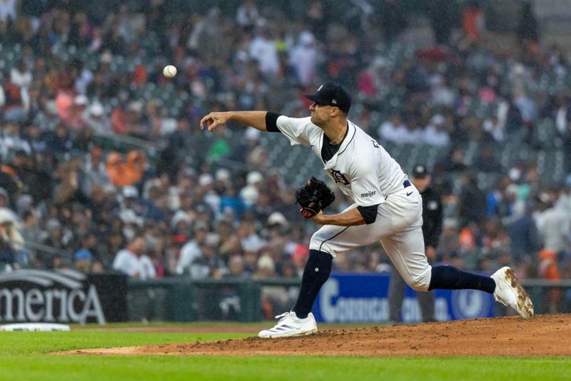 May 22, 2025; Detroit, Michigan, USA; Detroit Tigers pitcher Jack Flaherty (9) delivers in the rain in the fourth inning against the Cleveland Guardians at Comerica Park. Mandatory Credit: David Reginek-Imagn Images