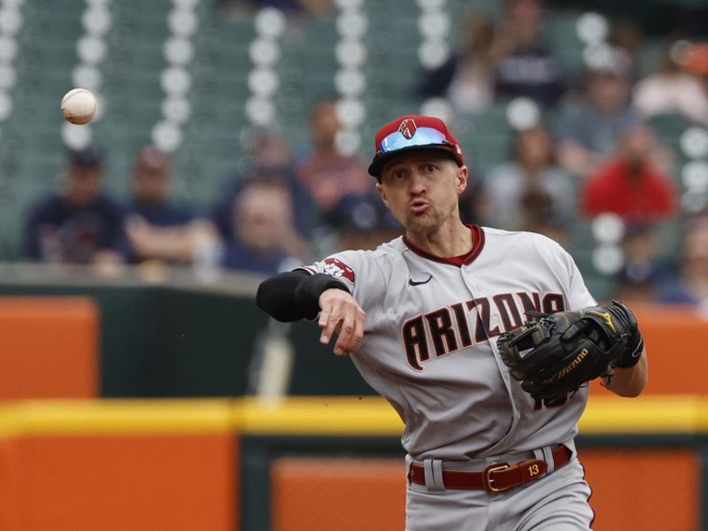 Jun 11, 2023; Detroit, Michigan, USA; Arizona Diamondbacks shortstop Nick Ahmed (13) makes a throw in the second inning against the Detroit Tigers at Comerica Park. Mandatory Credit: Rick Osentoski-USA TODAY Sports