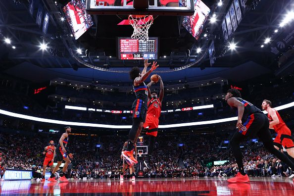 TORONTO, CANADA - NOVEMBER 19: Pascal Siakam #43 of the Toronto Raptors puts a shot up over Marvin Bagley III #35 of the Detroit Pistons during the second half of the game at Scotiabank Arena on November 19, 2023 in Toronto, Canada. NOTE TO USER: User expressly acknowledges and agrees that, by downloading and or using this photograph, User is consenting to the terms and conditions of the Getty Images License Agreement. (Photo by Cole Burston/Getty Images)