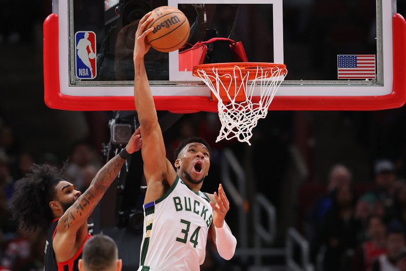 CHICAGO, ILLINOIS - MARCH 01: Giannis Antetokounmpo #34 of the Milwaukee Bucks dunks the ball against the Chicago Bulls during the second half at the United Center on March 01, 2024 in Chicago, Illinois. NOTE TO USER: User expressly acknowledges and agrees that, by downloading and or using this photograph, User is consenting to the terms and conditions of the Getty Images License Agreement. (Photo by Michael Reaves/Getty Images)