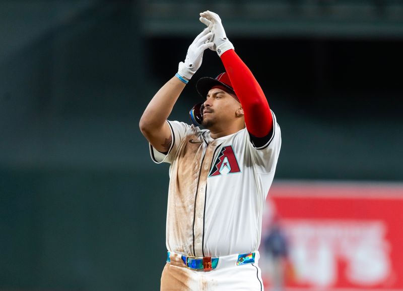 Apr 22, 2025; Phoenix, Arizona, USA; Arizona Diamondbacks first baseman Josh Naylor celebrates after hitting an RBI single in the eighth inning against the Tampa Bay Rays at Chase Field. Mandatory Credit: Mark J. Rebilas-Imagn Images