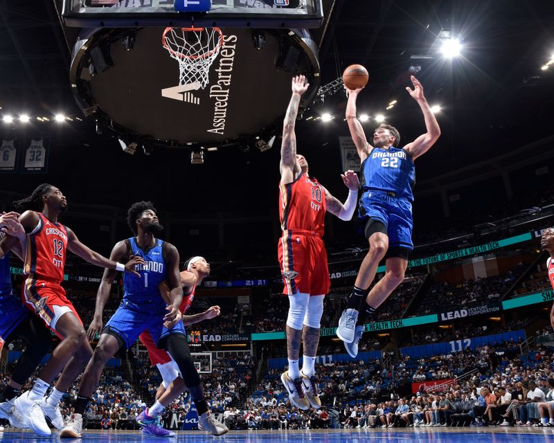 ORLANDO, FL - NOVEMBER 8: Franz Wagner #22 of the Orlando Magic shoots the ball during the game against the New Orleans Pelicans on November 8, 2024 at the Kia Center in Orlando, Florida. NOTE TO USER: User expressly acknowledges and agrees that, by downloading and or using this photograph, User is consenting to the terms and conditions of the Getty Images License Agreement. Mandatory Copyright Notice: Copyright 2024 NBAE (Photo by Fernando Medina/NBAE via Getty Images)