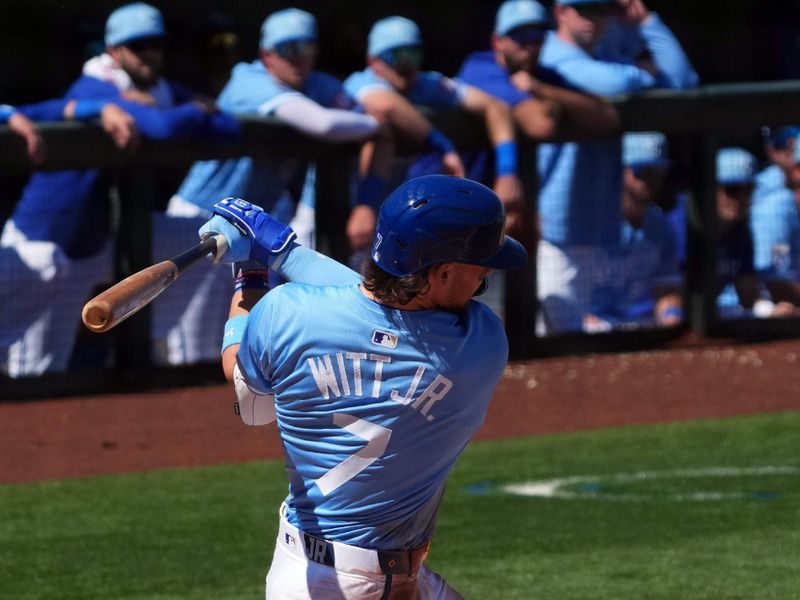 Mar 11, 2024; Surprise, Arizona, USA; Kansas City Royals shortstop Bobby Witt Jr. (7) bats against the San Francisco Giants during the second inning at Surprise Stadium. Mandatory Credit: Joe Camporeale-USA TODAY Sports