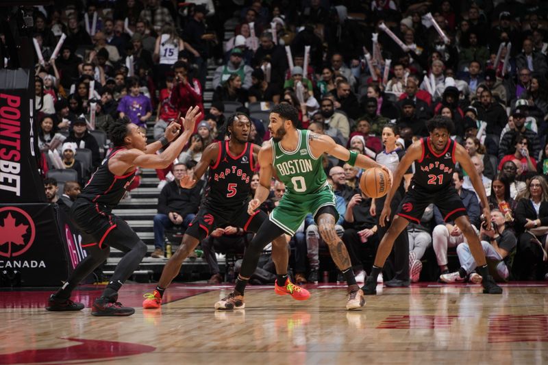 TORONTO, CANADA - JANUARY 15: Jayson Tatum #0 of the Boston Celtics handles the ball during the game against the Toronto Raptors  on January 15, 2024 at the Scotiabank Arena in Toronto, Ontario, Canada.  NOTE TO USER: User expressly acknowledges and agrees that, by downloading and or using this Photograph, user is consenting to the terms and conditions of the Getty Images License Agreement.  Mandatory Copyright Notice: Copyright 2024 NBAE (Photo by Mark Blinch/NBAE via Getty Images)