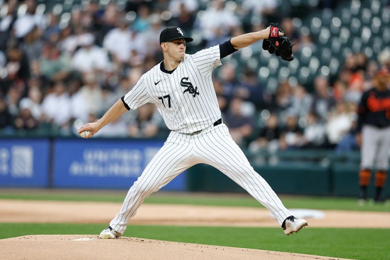 May 24, 2024; Chicago, Illinois, USA; Chicago White Sox starting pitcher Chris Flexen (77) delivers a pitch against the Baltimore Orioles during the first inning at Guaranteed Rate Field. Mandatory Credit: Kamil Krzaczynski-USA TODAY Sports