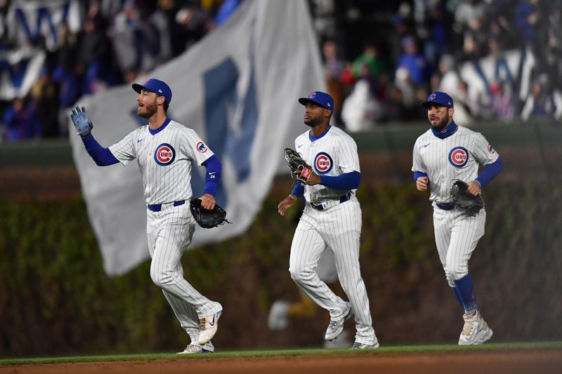 Apr 20, 2024; Chicago, Illinois, USA; The Chicago Cubs celebrate after defeating the Miami Marlins at Wrigley Field. Mandatory Credit: Patrick Gorski-USA TODAY Sports