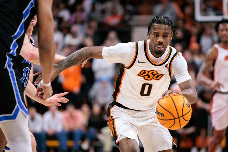 Feb 4, 2026; Stillwater, Oklahoma, USA; Oklahoma State Cowboys guard Jaylen Curry (0) dribbles during the first half against the BYU Cougars at Gallagher-Iba Arena. Mandatory Credit: William Purnell-Imagn Images