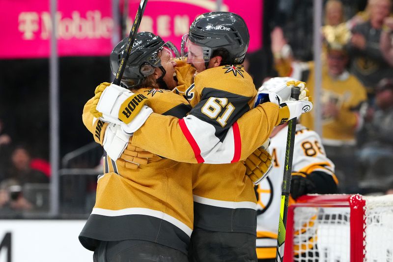 Oct 16, 2025; Las Vegas, Nevada, USA; Vegas Golden Knights center William Karlsson (71) celebrates with Vegas Golden Knights right wing Mark Stone (61) after scoring a short handed goal against the Boston Bruins during the second period at T-Mobile Arena. Mandatory Credit: Stephen R. Sylvanie-Imagn Images