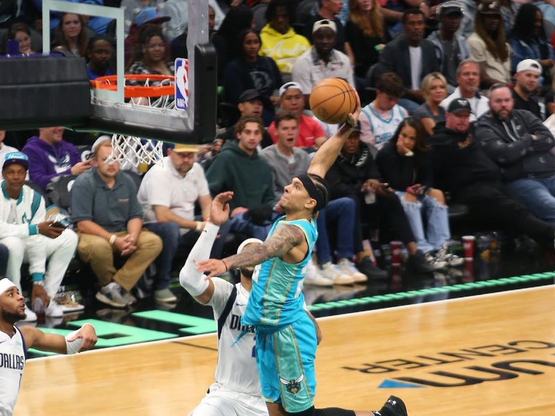 CHARLOTTE, NC - APRIL 9: Tre Mann #23 of the Charlotte Hornets drives to the basket during the game against the Dallas Mavericks on April 9, 2024 at Spectrum Center in Charlotte, North Carolina. NOTE TO USER: User expressly acknowledges and agrees that, by downloading and or using this photograph, User is consenting to the terms and conditions of the Getty Images License Agreement. Mandatory Copyright Notice: Copyright 2024 NBAE (Photo by Kent Smith/NBAE via Getty Images)