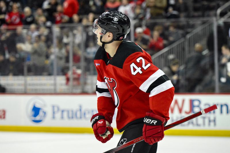 Apr 2, 2024; Newark, New Jersey, USA; New Jersey Devils center Curtis Lazar (42) reacts after scoring a goal against the Pittsburgh Penguins during the second period at Prudential Center. Mandatory Credit: John Jones-USA TODAY Sports