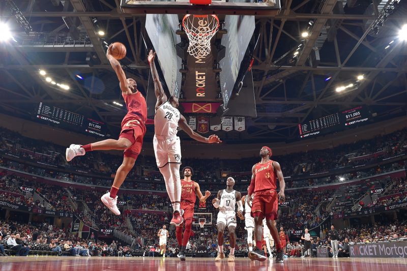 CLEVELAND, OH - MARCH 10: Isaac Okoro #35 of the Cleveland Cavaliers drives to the basket during the game against the Brooklyn Nets on March 10, 2024 at Rocket Mortgage FieldHouse in Cleveland, Ohio. NOTE TO USER: User expressly acknowledges and agrees that, by downloading and/or using this Photograph, user is consenting to the terms and conditions of the Getty Images License Agreement. Mandatory Copyright Notice: Copyright 2024 NBAE (Photo by David Liam Kyle/NBAE via Getty Images)