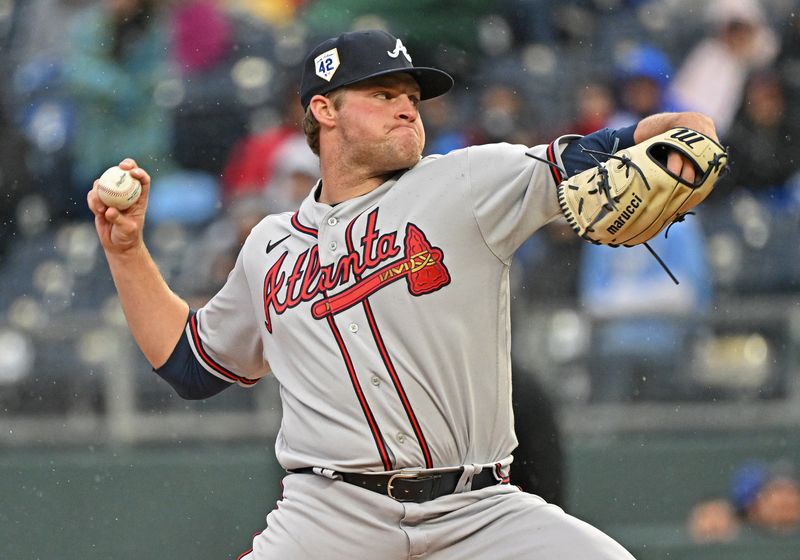 Apr 15, 2023; Kansas City, Missouri, USA;  Atlanta Braves starting pitcher Bryce Elder (55) delivers a pitch during the first inning against the Kansas City Royals at Kauffman Stadium. Mandatory Credit: Peter Aiken-USA TODAY Sports