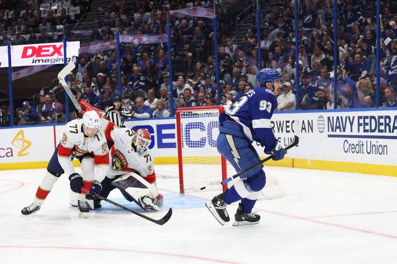 Apr 30, 2025; Tampa, Florida, USA; Tampa Bay Lightning center Gage Goncalves (93) celebrates after he scores a goal on Florida Panthers goaltender Sergei Bobrovsky (72) during the first period of game five of the first round of the 2025 Stanley Cup Playoffs at Amalie Arena. Mandatory Credit: Kim Klement Neitzel-Imagn Images