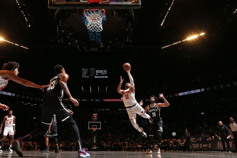 BROOKLYN, NY - JANUARY 23: Jalen Brunson #11 of the New York Knicks shoots the ball during the game against the Brooklyn Nets on January 23, 2024 at Barclays Center in Brooklyn, New York. NOTE TO USER: User expressly acknowledges and agrees that, by downloading and or using this Photograph, user is consenting to the terms and conditions of the Getty Images License Agreement. Mandatory Copyright Notice: Copyright 2024 NBAE (Photo by Nathaniel S. Butler/NBAE via Getty Images)