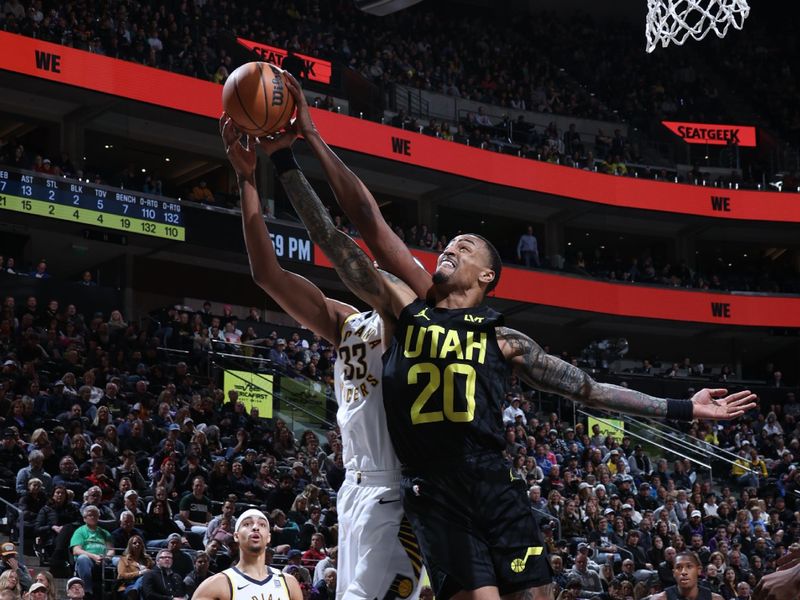 SALT LAKE CITY, UT - JANUARY 15: Myles Turner #33 of the Indiana Pacers and John Collins #20 of the Utah Jazz go up for the rebound during the game on January 15, 2024 at Delta Center in Salt Lake City, Utah. NOTE TO USER: User expressly acknowledges and agrees that, by downloading and or using this Photograph, User is consenting to the terms and conditions of the Getty Images License Agreement. Mandatory Copyright Notice: Copyright 2024 NBAE (Photo by Melissa Majchrzak/NBAE via Getty Images)