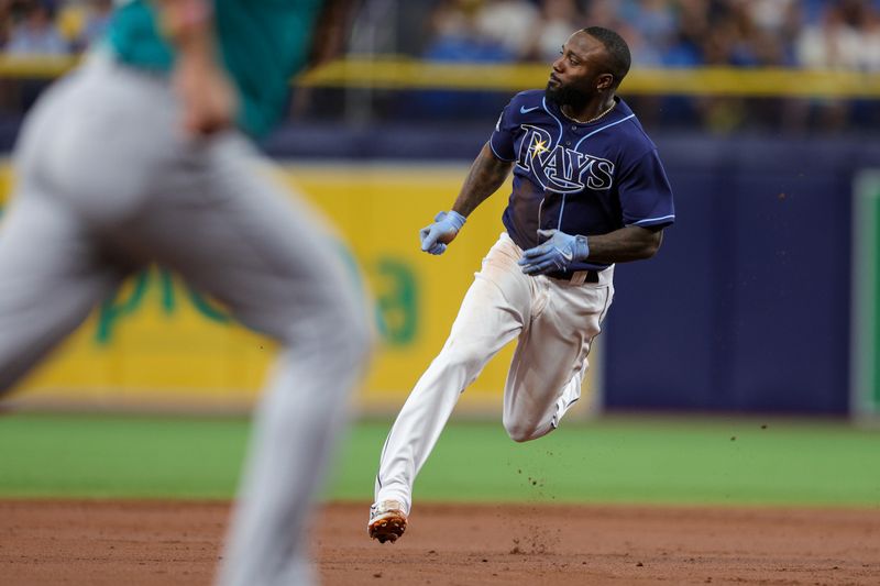 Sep 9, 2023; St. Petersburg, Florida, USA;  Tampa Bay Rays left fielder Randy Arozarena (56) rounds second base against the Seattle Mariners in the first inning at Tropicana Field. Mandatory Credit: Nathan Ray Seebeck-USA TODAY Sports