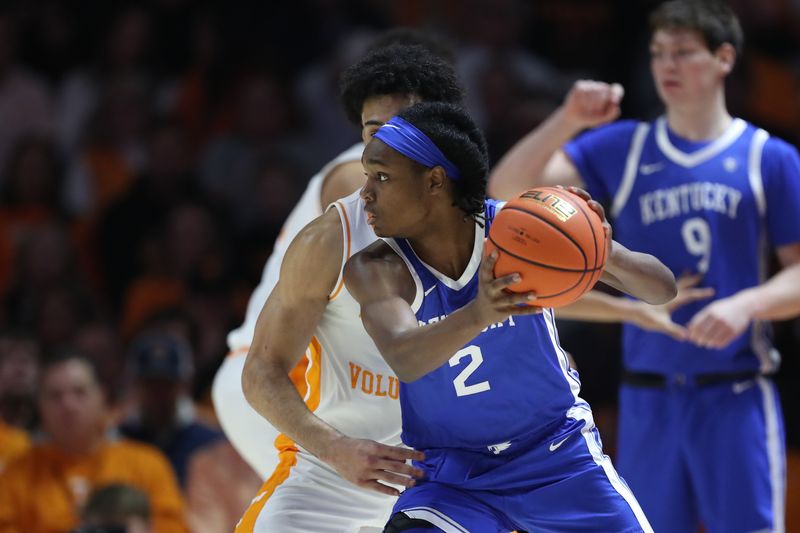 Jan 17, 2026; Knoxville, Tennessee, USA;  Kentucky Wildcats guard Jasper Johnson (2) moves the ball against Tennessee Volunteers guard Ja'kobi Gillespie (0) during the first half at Thompson-Boling Arena at Food City Center. Mandatory Credit: Randy Sartin-Imagn Images
