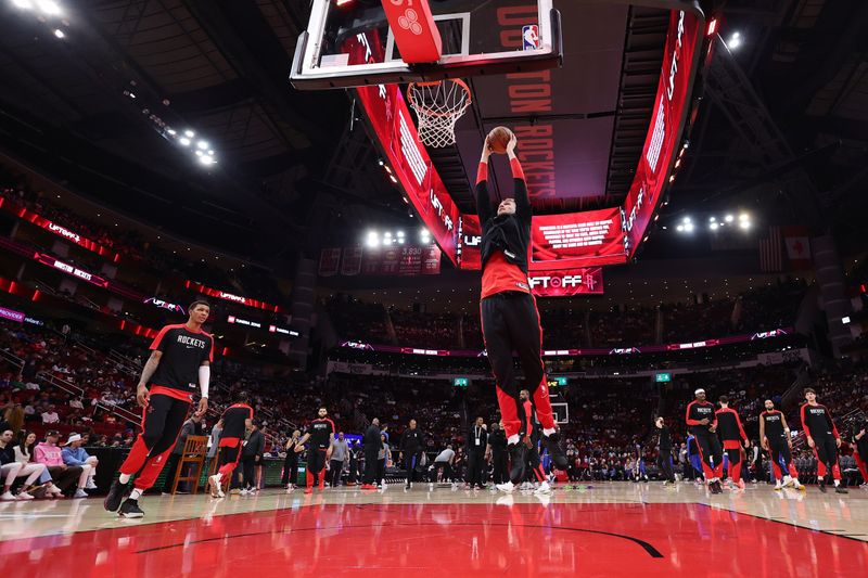 HOUSTON, TEXAS - JANUARY 01: Jock Landale #2 of the Houston Rockets warms up before a game against the Dallas Mavericks at Toyota Center on January 01, 2025 in Houston, Texas. NOTE TO USER: User expressly acknowledges and agrees that, by downloading and or using this photograph, User is consenting to the terms and conditions of the Getty Images License Agreement. (Photo by Alex Slitz/Getty Images)