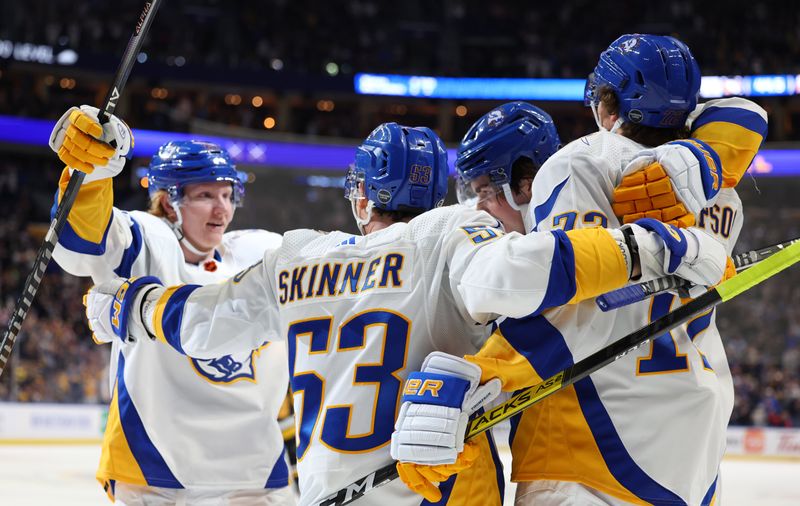 Dec 9, 2022; Buffalo, New York, USA;  Buffalo Sabres left wing Jeff Skinner (53) celebrates his goal with teammates during the second period against the Pittsburgh Penguins at KeyBank Center. Mandatory Credit: Timothy T. Ludwig-USA TODAY Sports