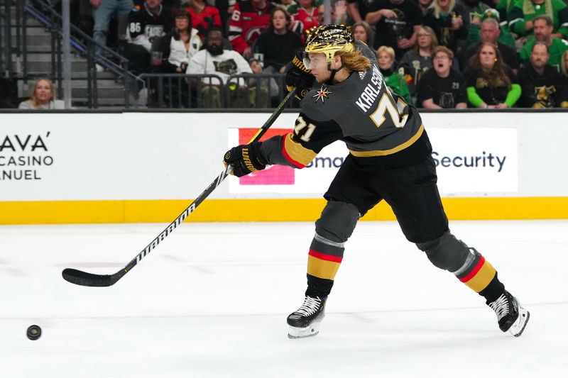 Mar 17, 2024; Las Vegas, Nevada, USA;Vegas Golden Knights center William Karlsson (71) shoots against the New Jersey Devils during the first period at T-Mobile Arena. Mandatory Credit: Stephen R. Sylvanie-USA TODAY Sports