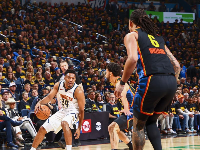 OKLAHOMA CITY, OK - MAY 7: Jalen Pickett #24 of the Denver Nuggets dribbles the ball during Round 2, Game 2 of the 2025 NBA Playoffs against the Oklahoma City Thunder on May 7, 2025 at Paycom Center in Oklahoma City, Oklahoma. NOTE TO USER: User expressly acknowledges and agrees that, by downloading and or using this photograph, User is consenting to the terms and conditions of the Getty Images License Agreement. Mandatory Copyright Notice: Copyright 2024 NBAE (Photo by Zach Beeker/NBAE via Getty Images)