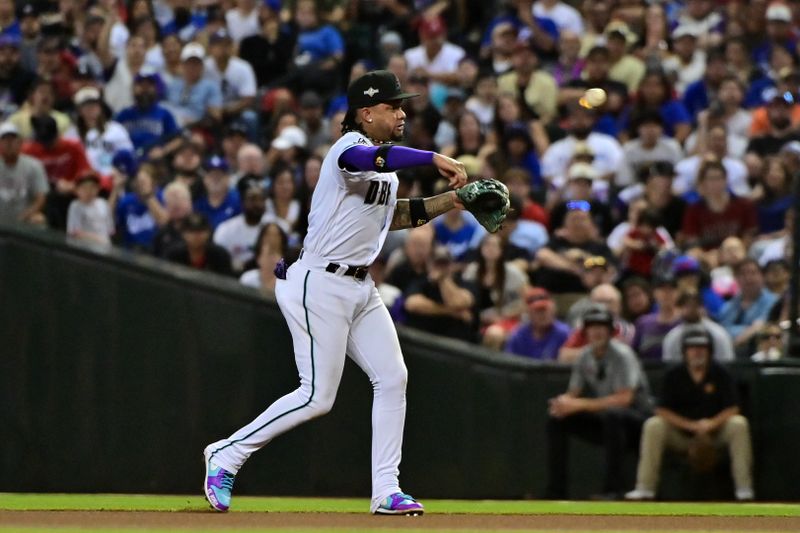 Oct 11, 2023; Phoenix, Arizona, USA; Arizona Diamondbacks second baseman Ketel Marte (4) throws the ball to first base to get the out against the Los Angeles Dodgers in the seventh inning for game three of the NLDS for the 2023 MLB playoffs at Chase Field. Mandatory Credit: Matt Kartozian-USA TODAY Sports