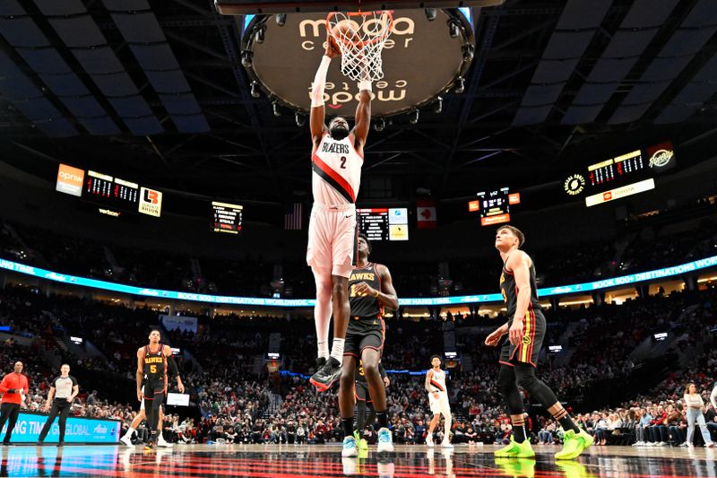 PORTLAND, OREGON - MARCH 13: Deandre Ayton #2 of the Portland Trail Blazers dunks the ball during the first quarter of the game against the Atlanta Hawks at the Moda Center on March 13, 2024 in Portland, Oregon. The Portland Trail Blazers won 106-102. NOTE TO USER: User expressly acknowledges and agrees that, by downloading and or using this photograph, User is consenting to the terms and conditions of the Getty Images License Agreement. (Photo by Alika Jenner/Getty Images)