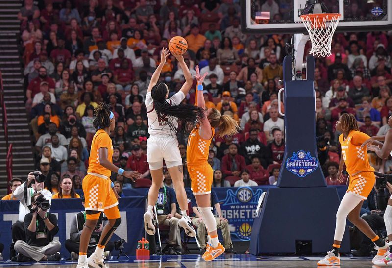 Mar 5, 2023; Greenville, SC, USA; South Carolina guard Brea Beal (12) shoots against Tennessee during the first quarter of the SEC Women's Basketball Tournament at Bon Secours Wellness Arena. Mandatory Credit: Ken Ruinard-USA TODAY Sports