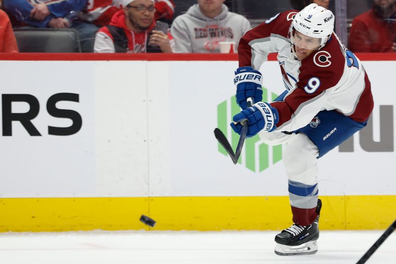 Feb 22, 2024; Detroit, Michigan, USA; Colorado Avalanche left wing Zach Parise (9) takes a shot in the first period against the Detroit Red Wings at Little Caesars Arena. Mandatory Credit: Rick Osentoski-USA TODAY Sports