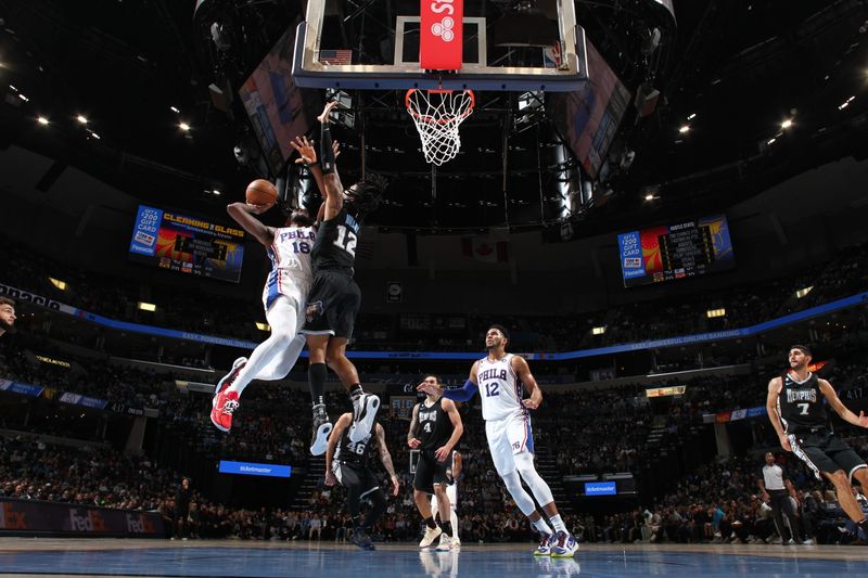 MEMPHIS, TN - DECEMBER 2: Shake Milton #18 of the Philadelphia 76ers drives to the basket, defended by Ja Morant #12 of the Memphis Grizzlies during the game on December 2, 2022 at FedExForum in Memphis, Tennessee. NOTE TO USER: User expressly acknowledges and agrees that, by downloading and or using this photograph, User is consenting to the terms and conditions of the Getty Images License Agreement. Mandatory Copyright Notice: Copyright 2022 NBAE (Photo by Joe Murphy/NBAE via Getty Images)