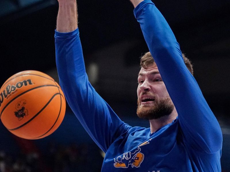 Dec 22, 2023; Lawrence, Kansas, USA; Kansas Jayhawks center Hunter Dickinson (1) warms up against the Yale Bulldogs prior to a game at Allen Fieldhouse. Mandatory Credit: Denny Medley-USA TODAY Sports