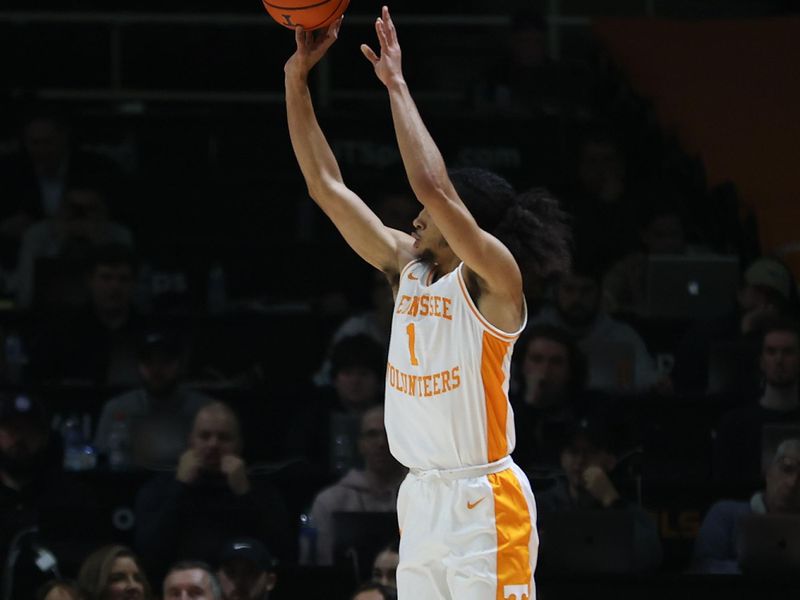 Dec 12, 2023; Knoxville, Tennessee, USA; Tennessee Volunteers guard Freddie Dilione V (1) shoots a three point shot against the Georgia Southern Eagles during the first half at Food City Center at Thompson-Boling Arena. Mandatory Credit: Randy Sartin-USA TODAY Sports