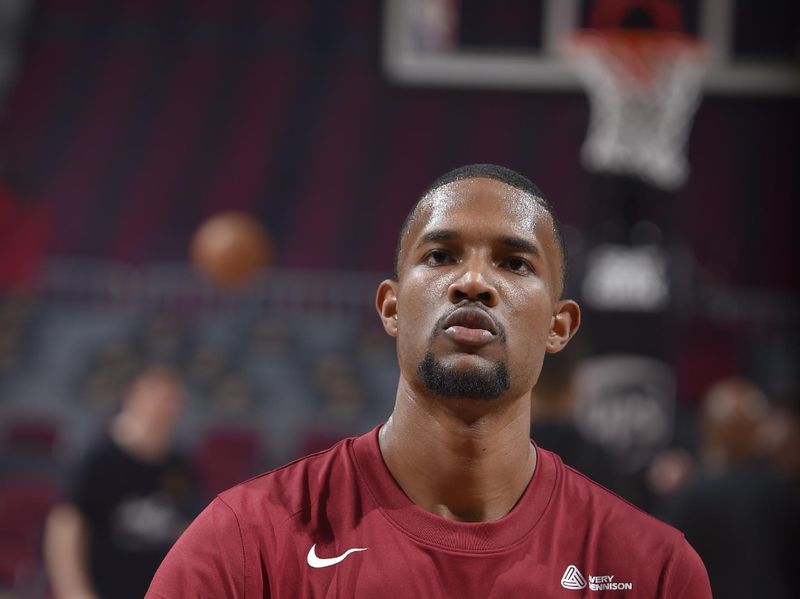 CLEVELAND, OH - NOVEMBER 20: Evan Mobley #4 of the Cleveland Cavaliers warms up before the game against the Miami Heat on November 20, 2022 at Rocket Mortgage FieldHouse in Cleveland, Ohio. NOTE TO USER: User expressly acknowledges and agrees that, by downloading and/or using this Photograph, user is consenting to the terms and conditions of the Getty Images License Agreement. Mandatory Copyright Notice: Copyright 2022 NBAE (Photo by David Liam Kyle/NBAE via Getty Images)