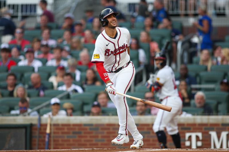 Jul 22, 2024; Atlanta, Georgia, USA; Atlanta Braves first baseman Matt Olson (28) reacts after being hit by a pitch against the Cincinnati Reds in the second inning at Truist Park. Mandatory Credit: Brett Davis-USA TODAY Sports
